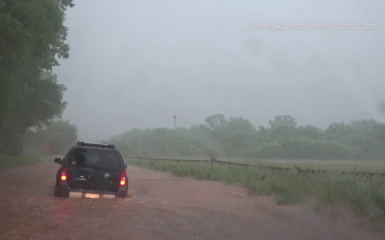 Car drives into flooding