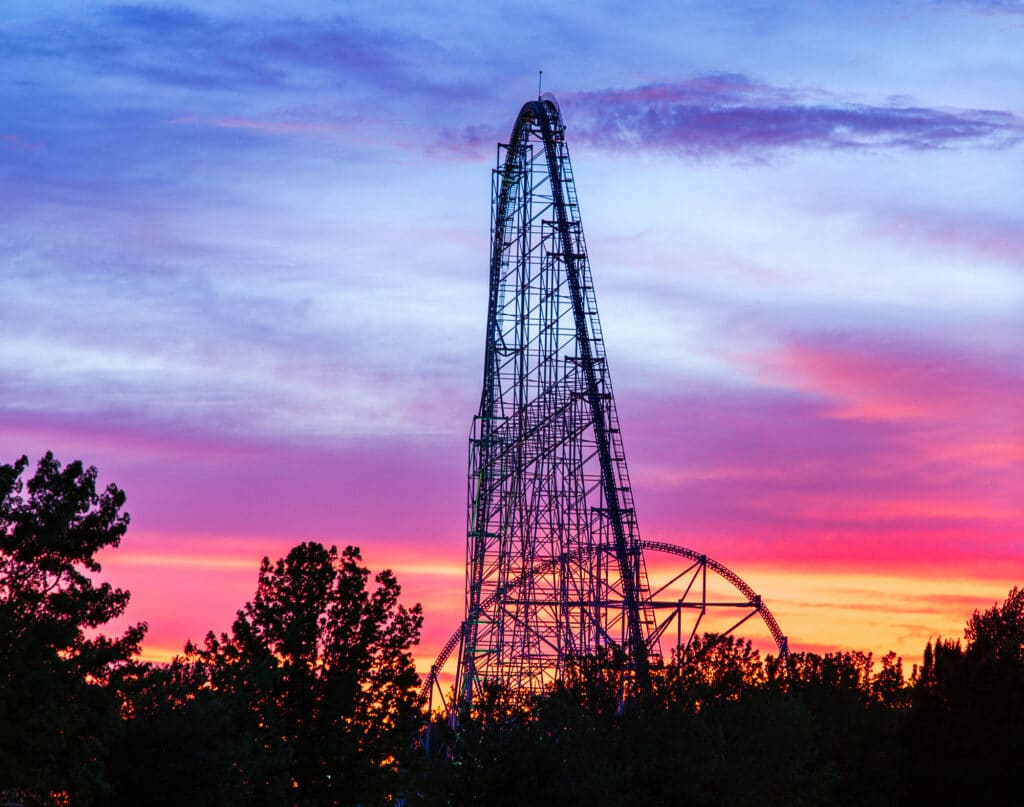 The sun sets behind the Millennium Force at Cedar Point