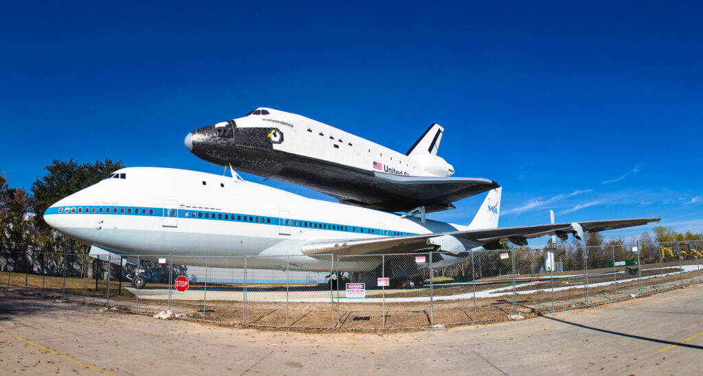 The 747 that carried the space shuttle cross country and the Independence mock up on the back