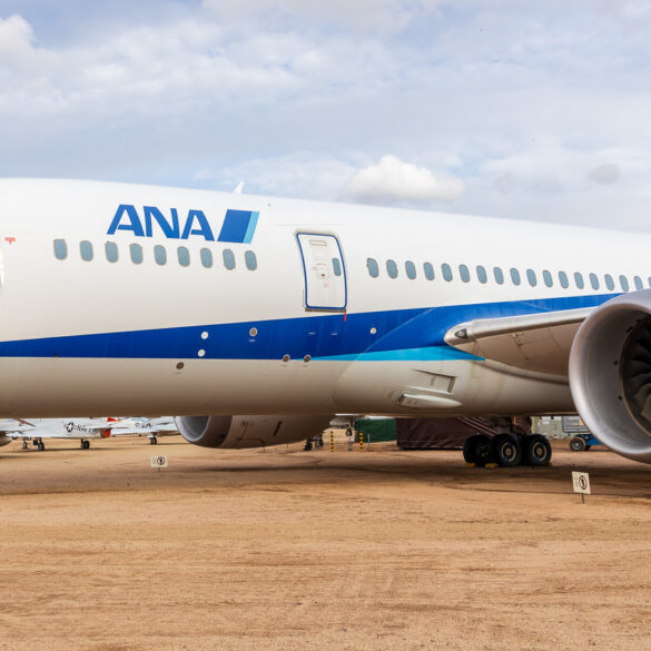 N787EX ANA Boeing 787 Dreamliner with some A-10s flying in the background